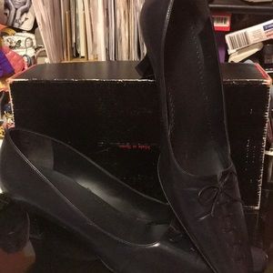 Black leather shoes with 2 inch heel
